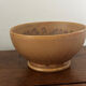 Vintage stoneware bowl on a vintage stand.