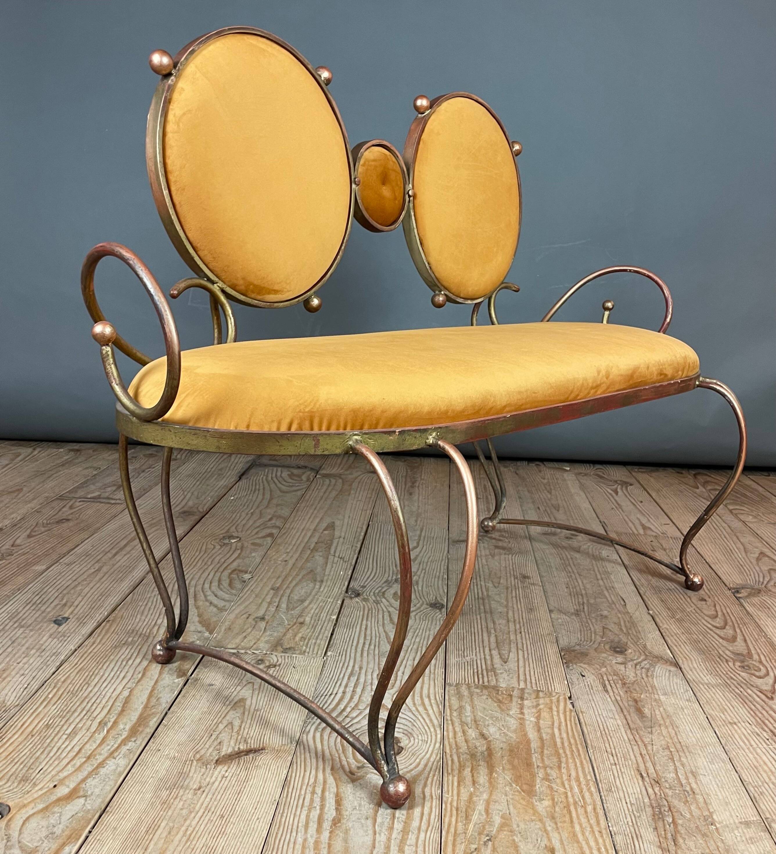 Wrought iron and velvet sofa