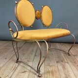 Wrought iron and velvet sofa