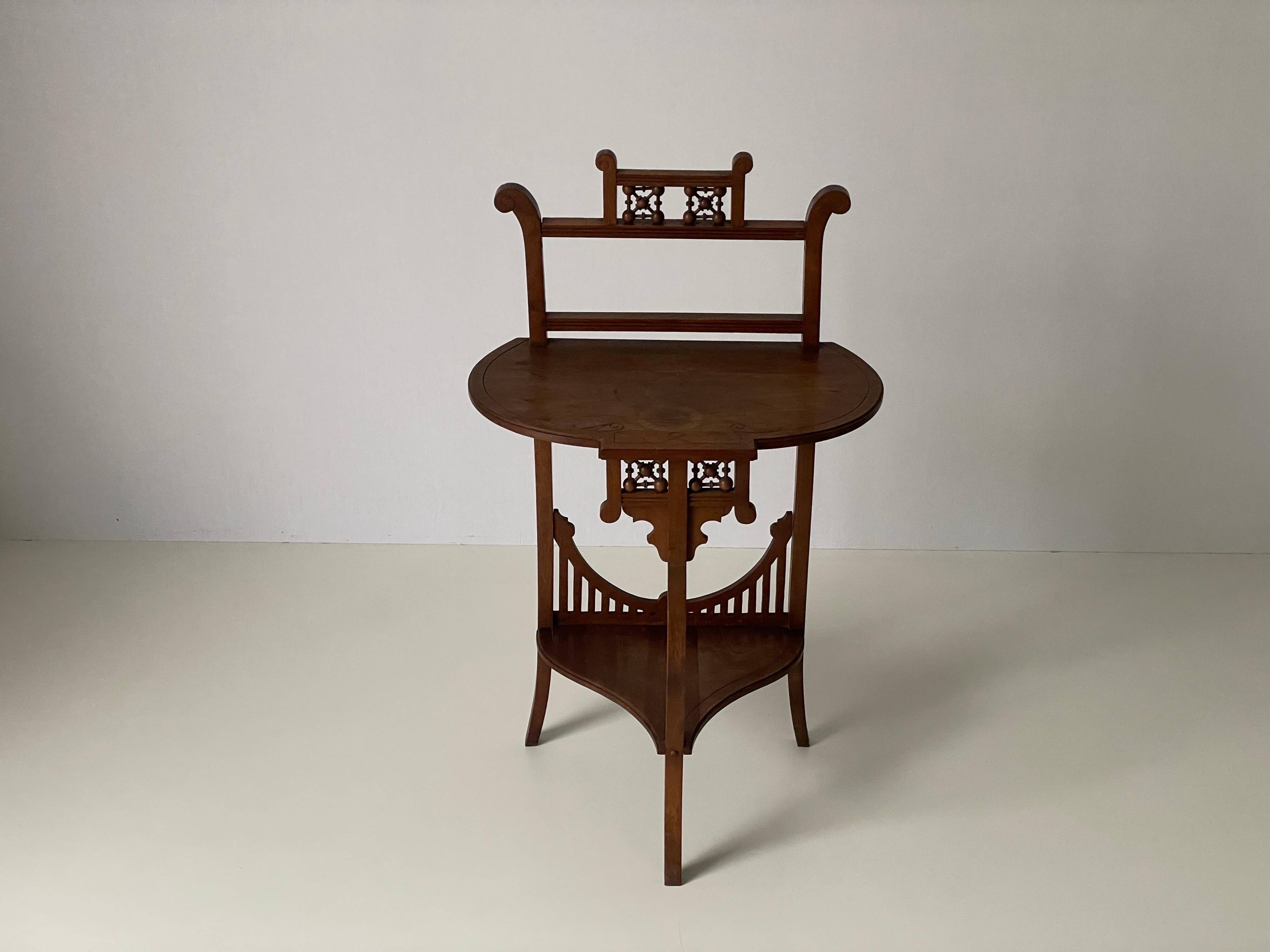 Two-tier walnut console table, 1950s, France.