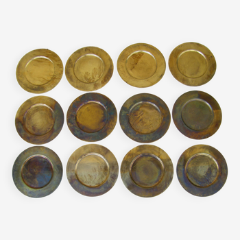 Series of twelve vintage brass sub-plates