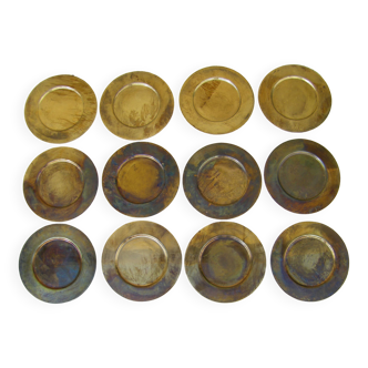 Series of twelve vintage brass sub-plates