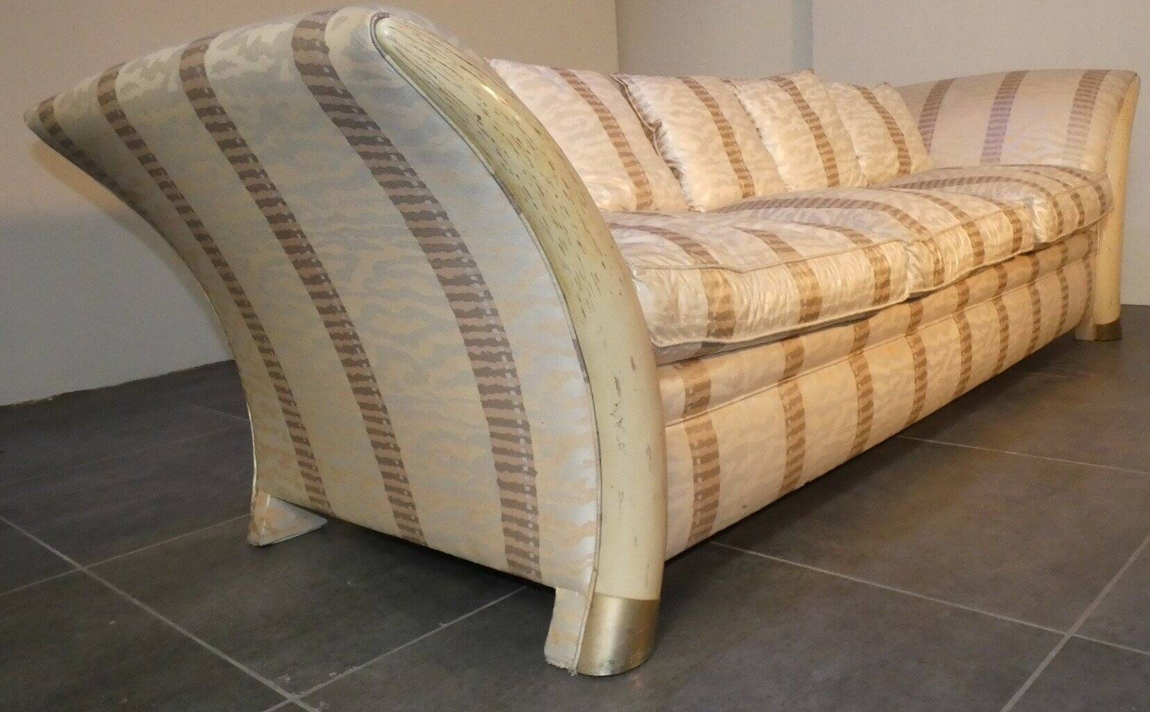 Sofa and armchair in colonial style with saber legs in resin, Italy, 1970s.