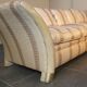 Sofa and armchair in colonial style with saber legs in resin, Italy, 1970s.