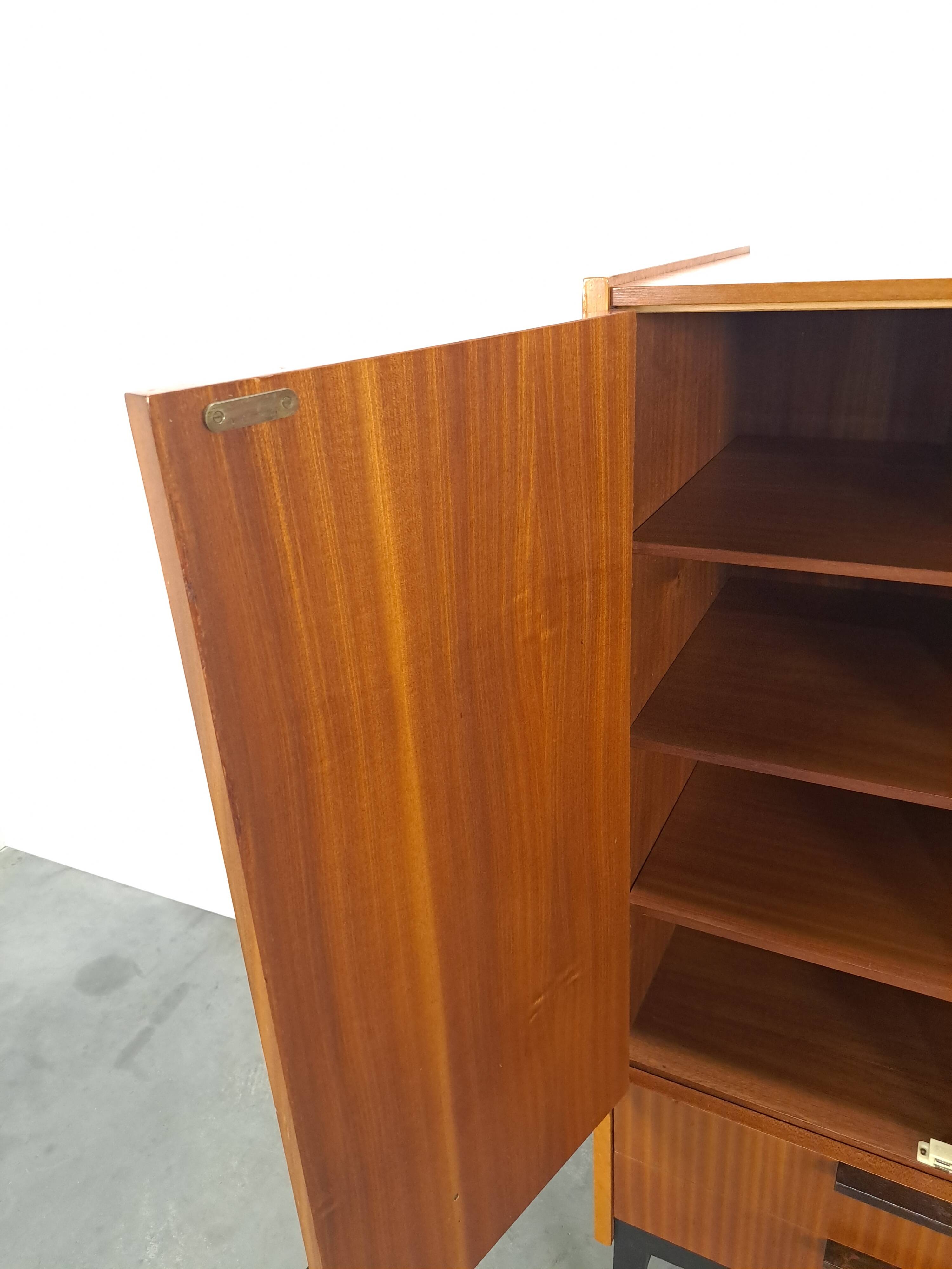 Design Mezulanik showcase with shelves