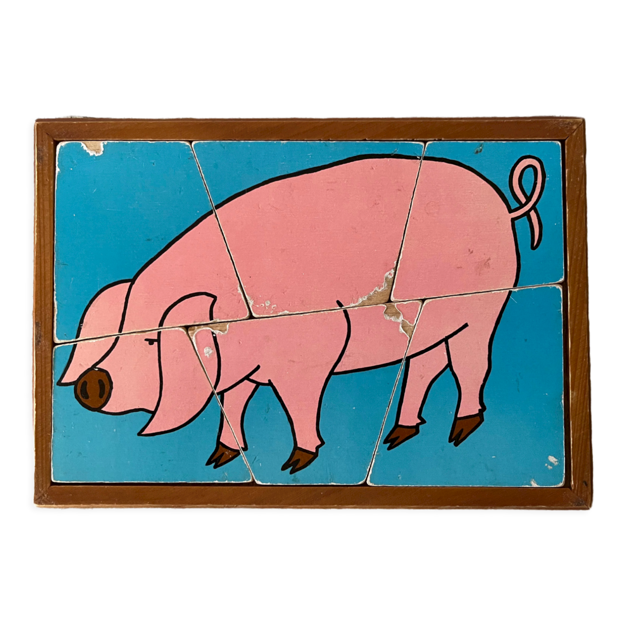 Wooden puzzle frame from the 50s/60s depicting a pink pig