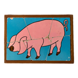 Cadre puzzle en bois des années 50-60 représentant un cochon rose