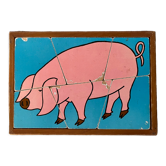 Wooden puzzle frame from the 50s/60s depicting a pink pig