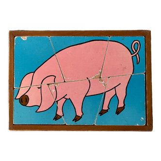 Cadre puzzle en bois des années 50-60 représentant un cochon rose