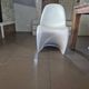 10 white chairs in the style of Verner Panton