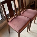 Set of 2 wooden chairs with padded seats.