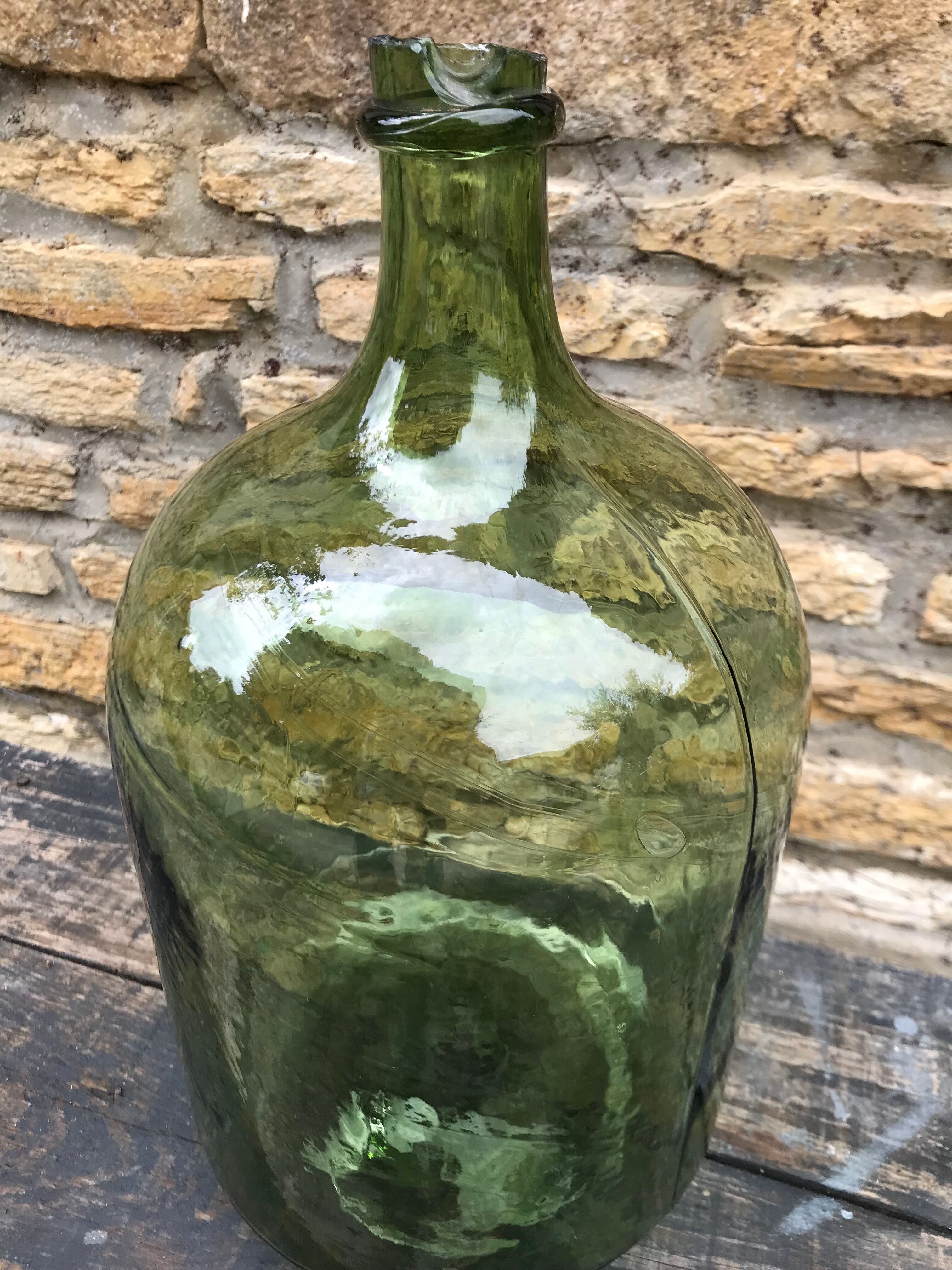 Green and oval demijohn