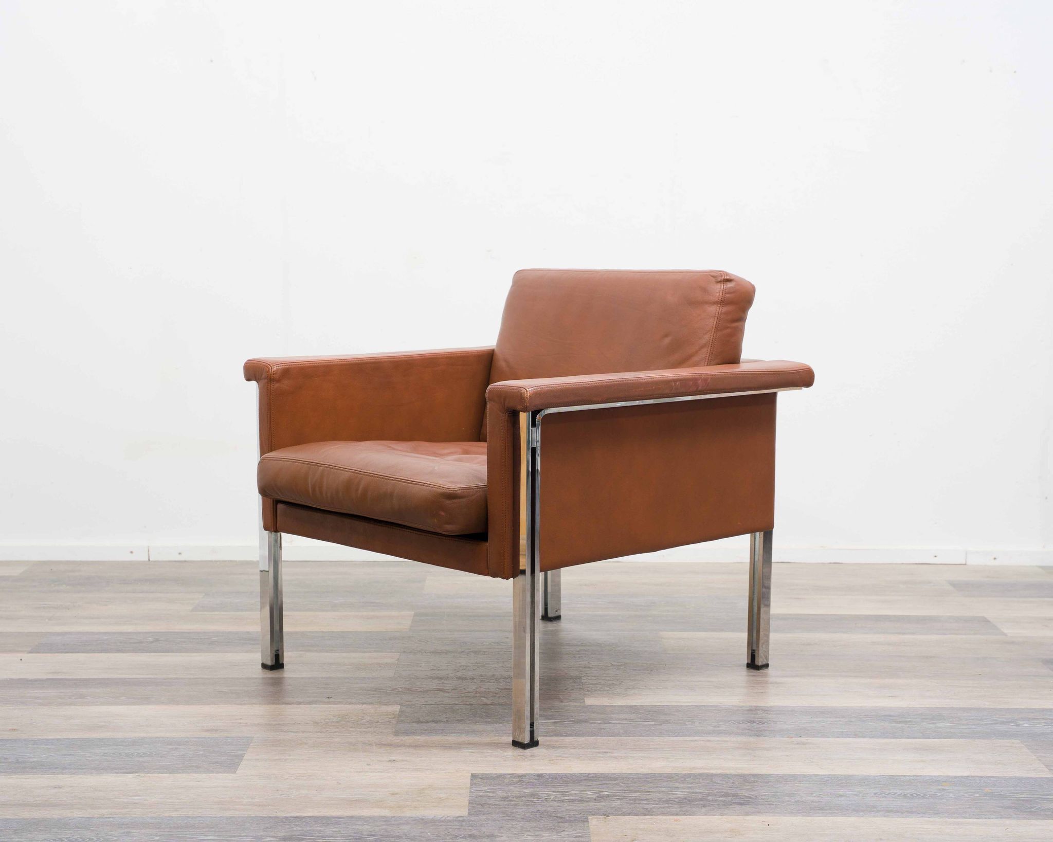 Leather armchair, 1970s, manufacturer Sitag, cognac brown leather.