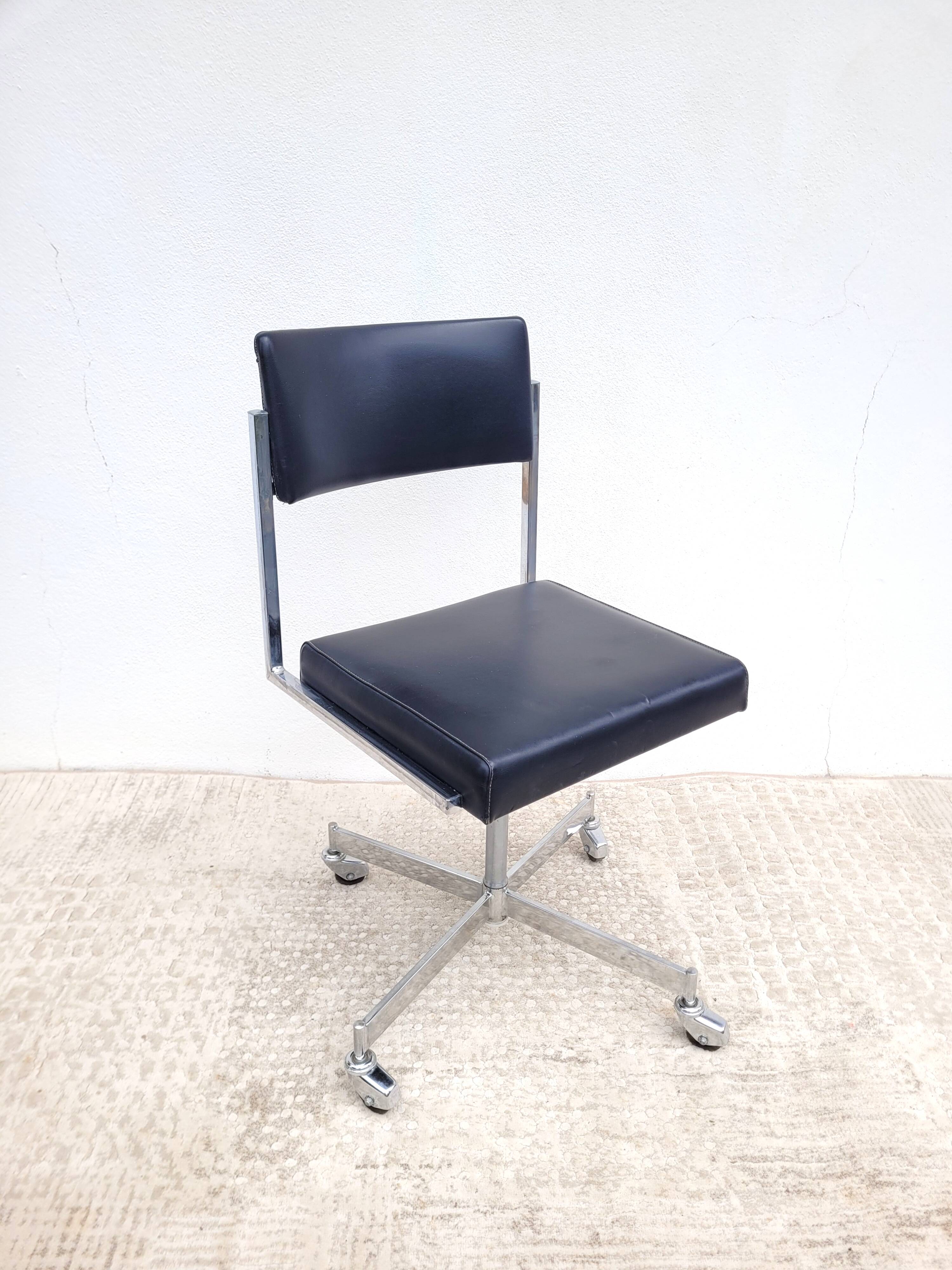 Vintage swivel office chair with casters