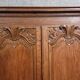 Louis XIV period wardrobe in solid oak, decorated with superb carvings