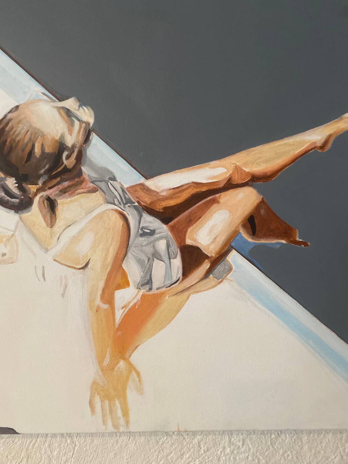 Seated woman painting