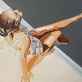 Seated woman painting