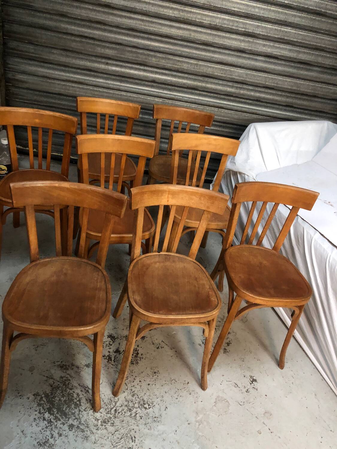 8 antique Baumann bistro chairs