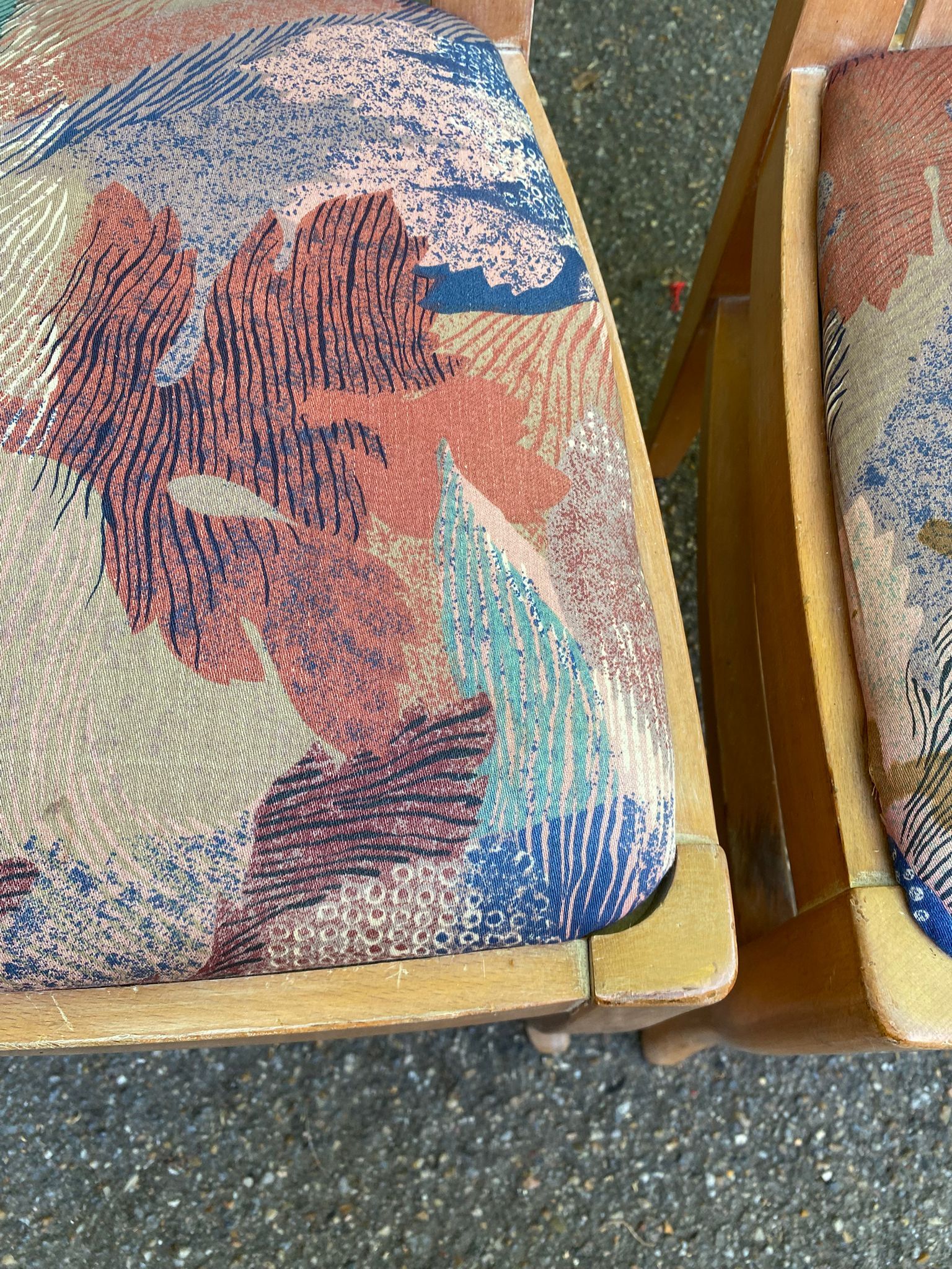 2 dining or kitchen chairs with high backs and fabric.