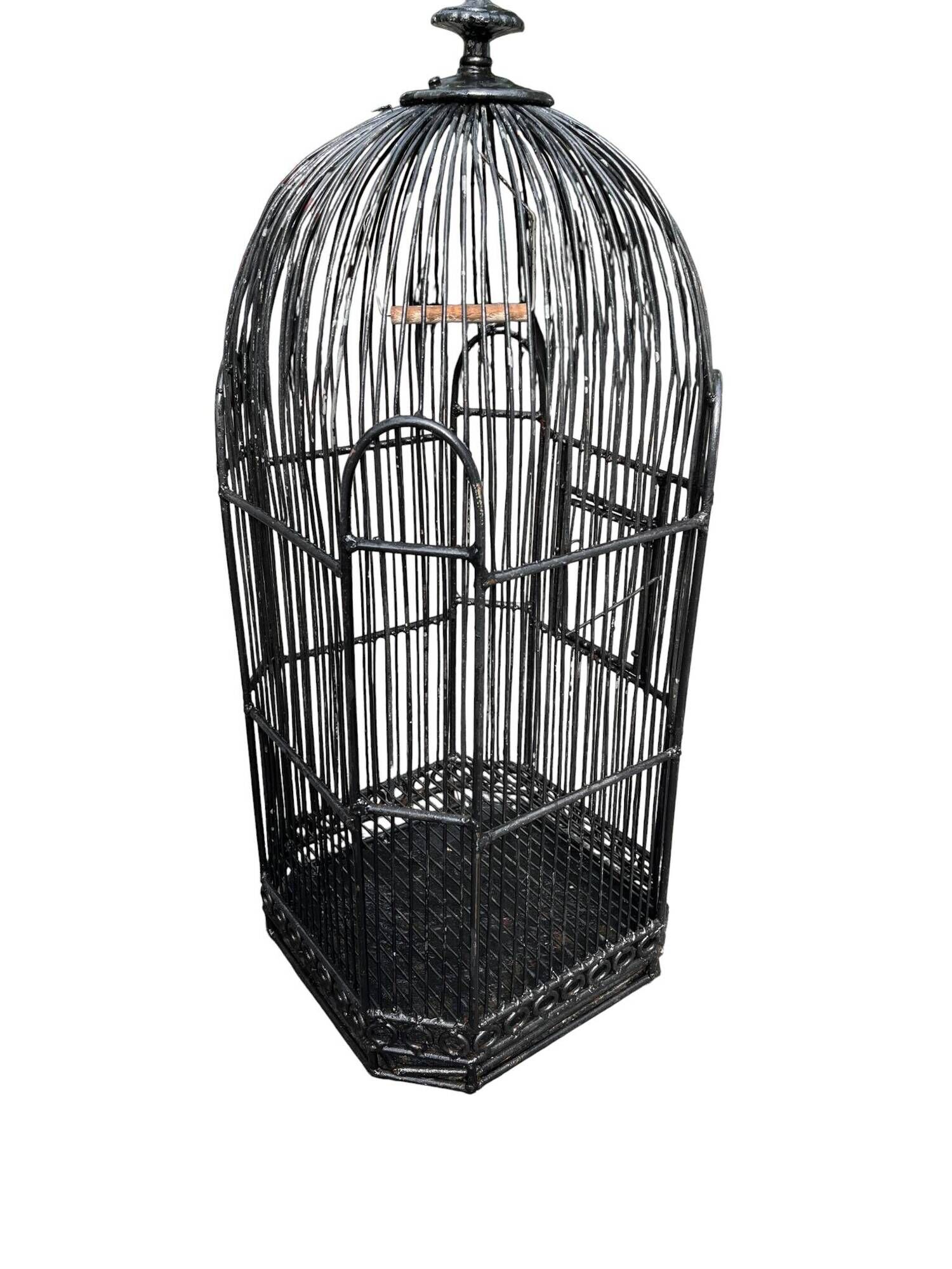 Old black metal birdcage from the early 20th century.