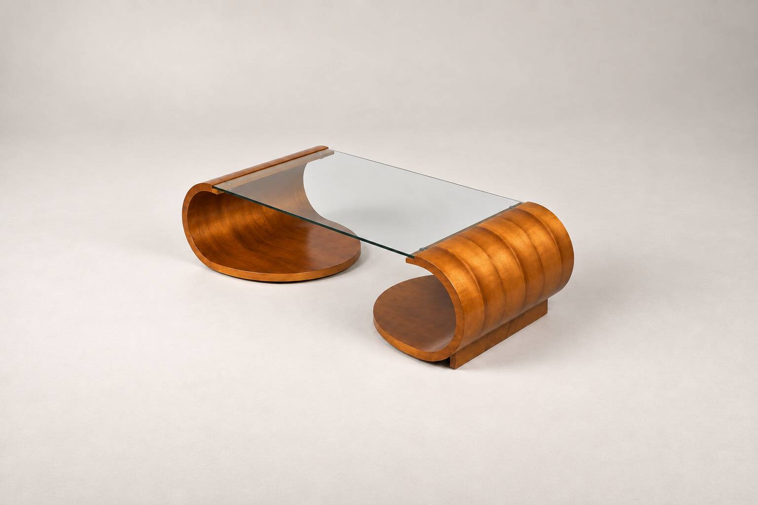 Sculptural coffee table in wood and glass — circa 1970