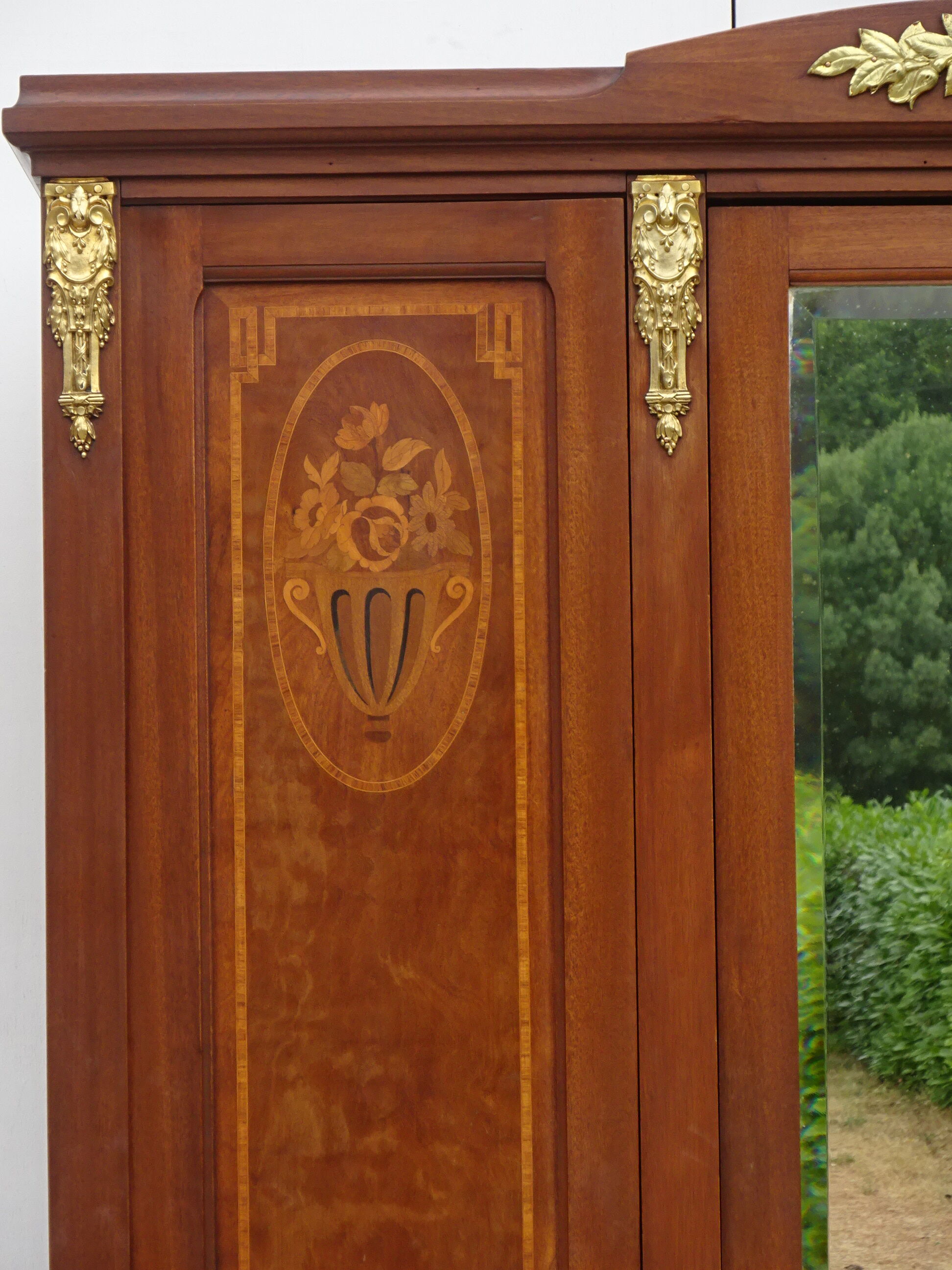 Louis XVI style wardrobe late nineteenth century, mahogany and marquetry