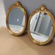 Paire de miroirs oval  doré vintage