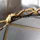 Bronze mirror gilded with roses, 72 cm