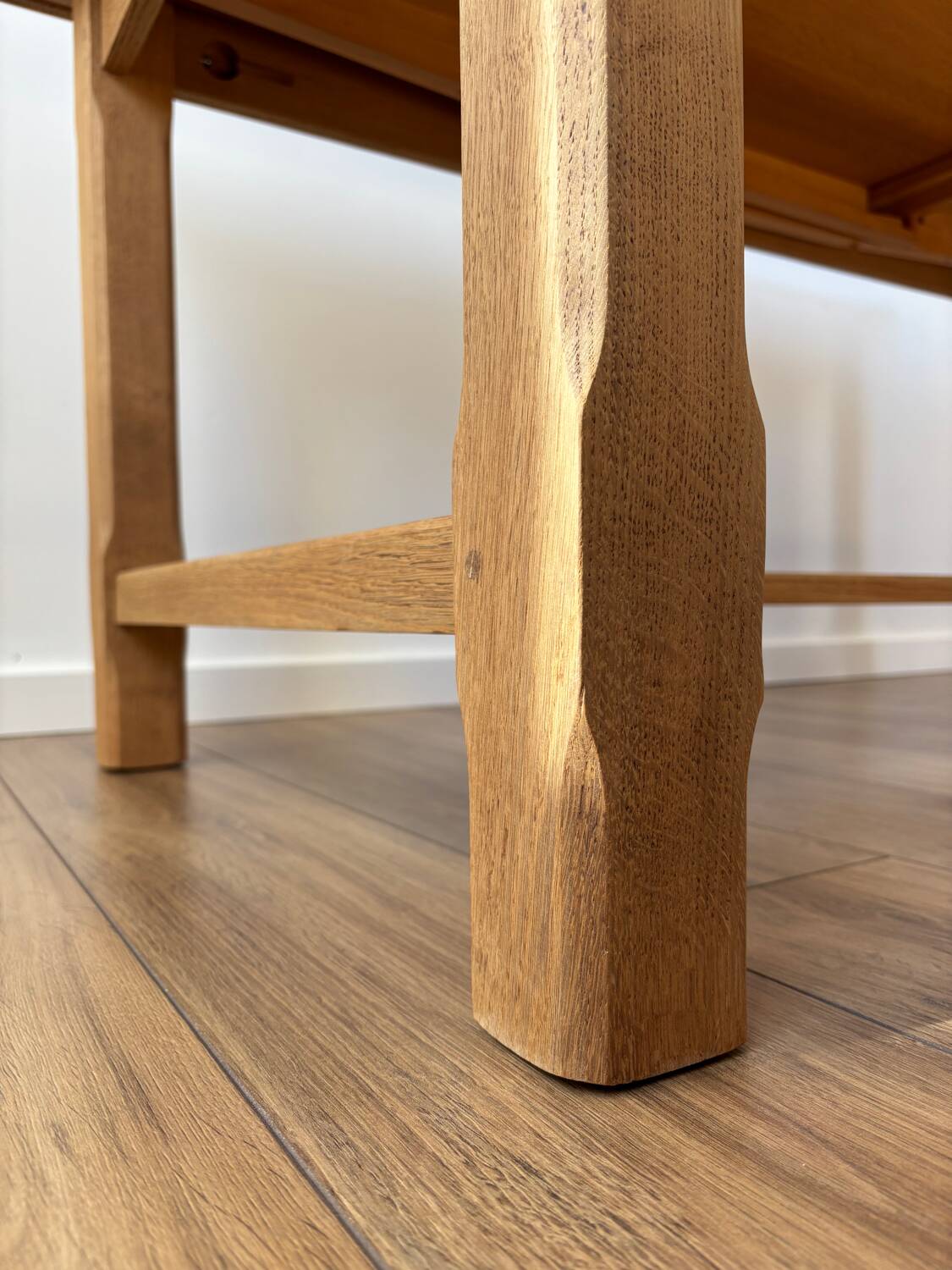 Solid oak farmhouse table with extensions.