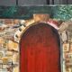 Oil on canvas by Claude Claveau wall with red door 20th century