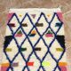 Small handmade Moroccan rug, small Beni Ouarain rug in Berber wool,