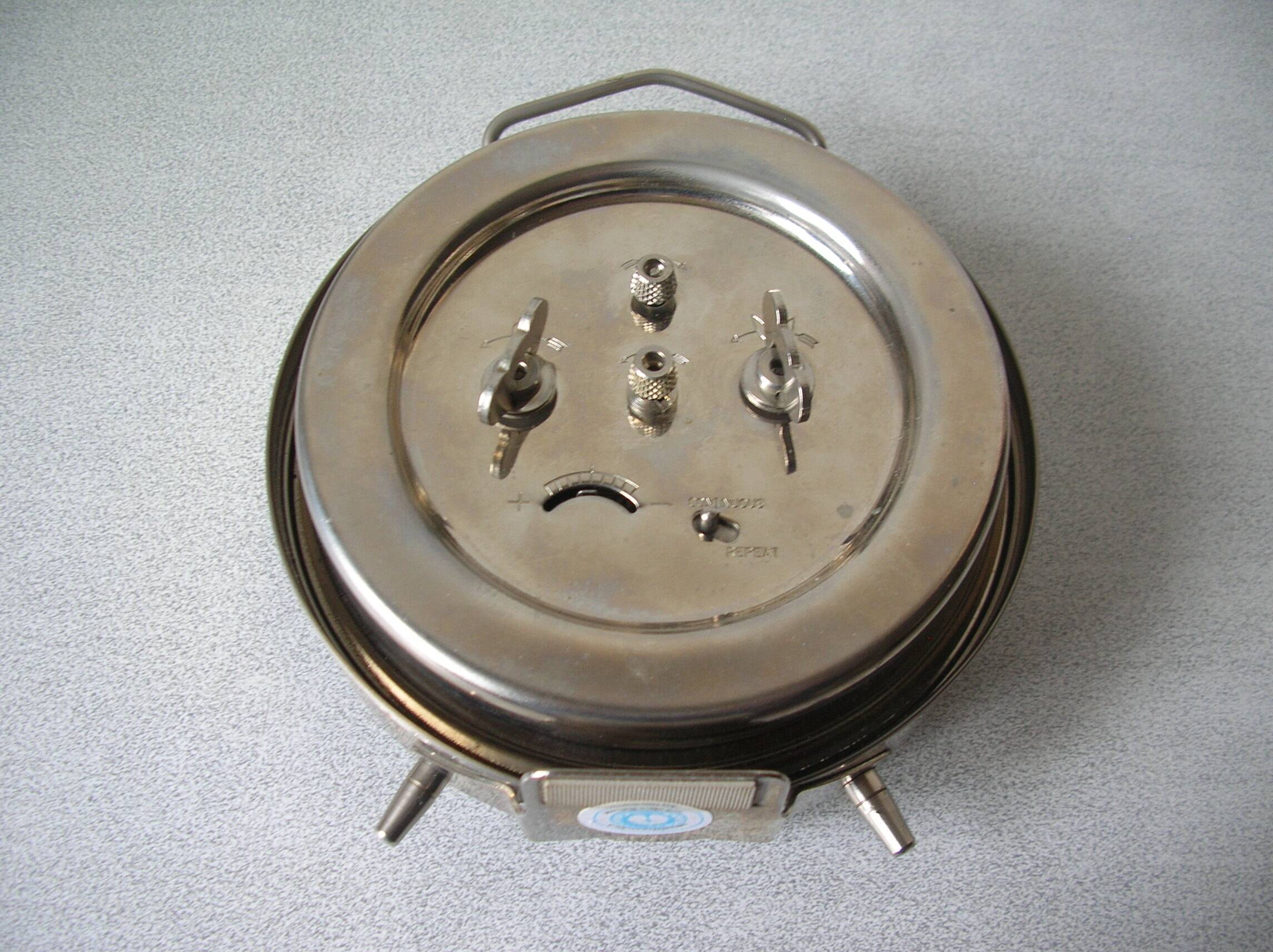 Old large mechanical alarm clock Peter Repeat Alarm chrome metal vintage retro decoration