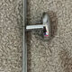 Wall coat rack with 3 hooks in chrome metal from the 80s