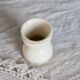 Antique egg cup, ironstone diabolo, ivory and gold edging