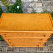 Dresser and its bedside table in rattan caning and vintage oak from the 1970s.