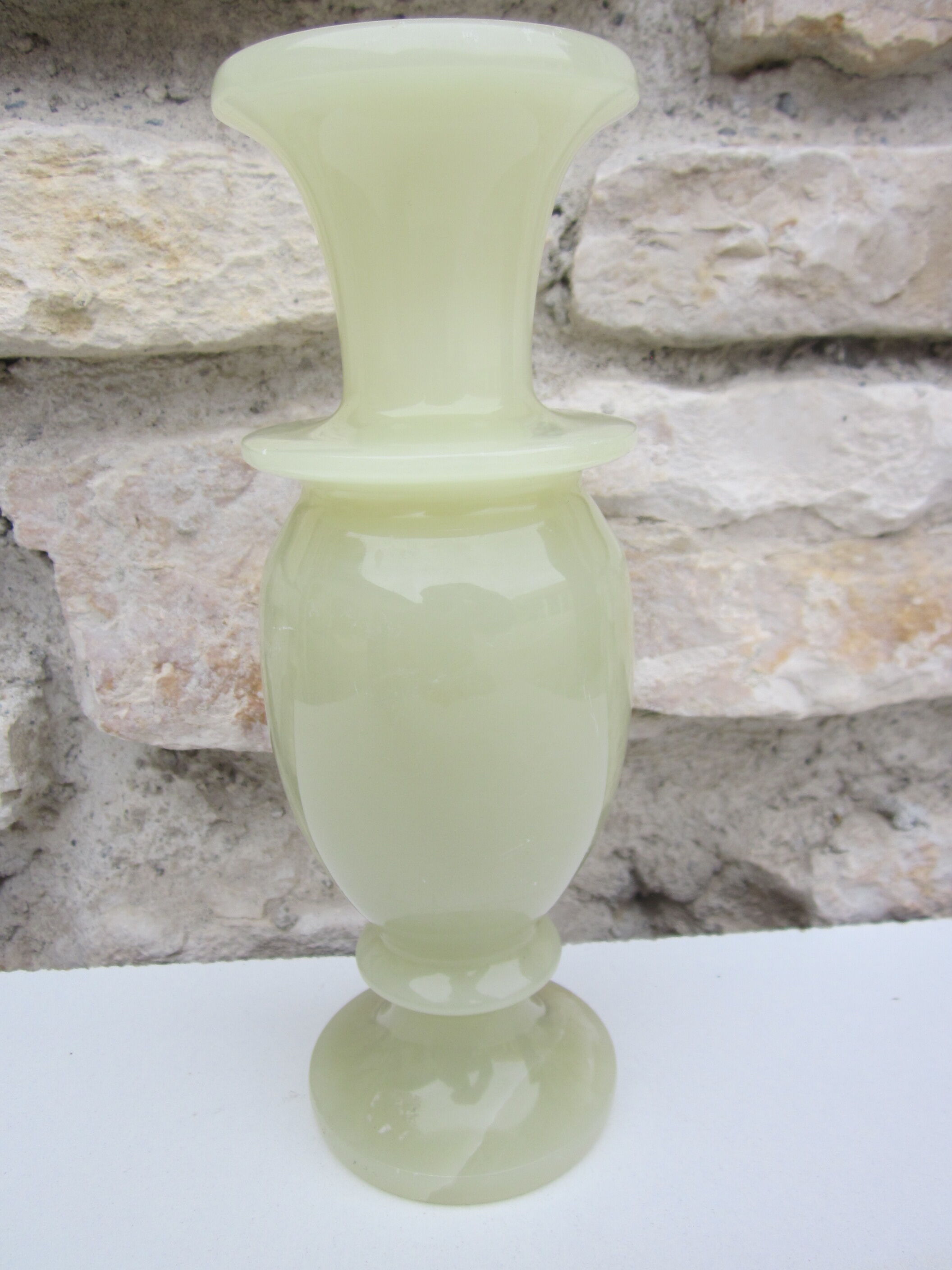 Vase in translucent natural stone of very light green color