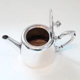 Egoistic silver metal teapot