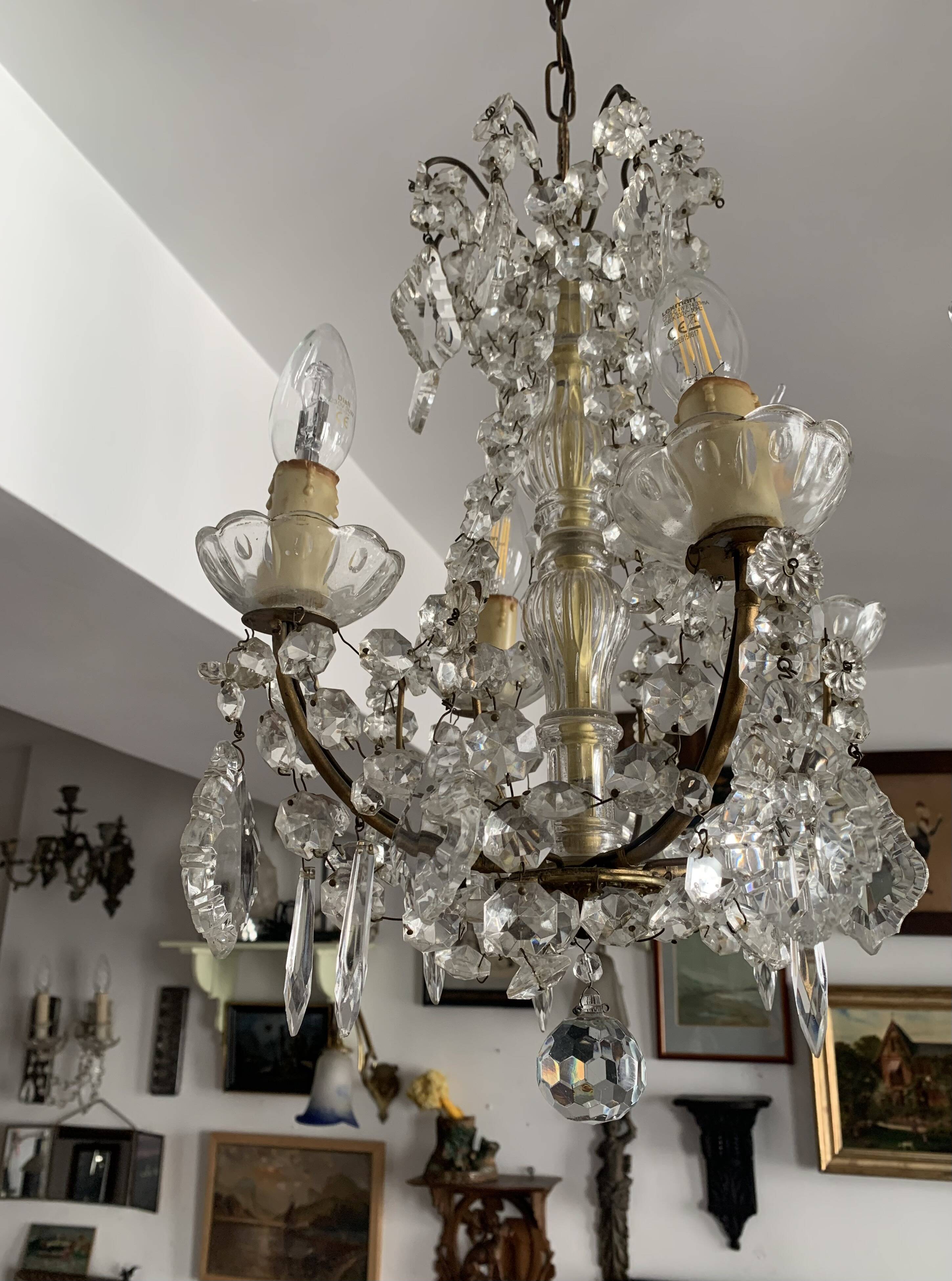 Small antique chandelier with tassels and bronze from the early 20th century