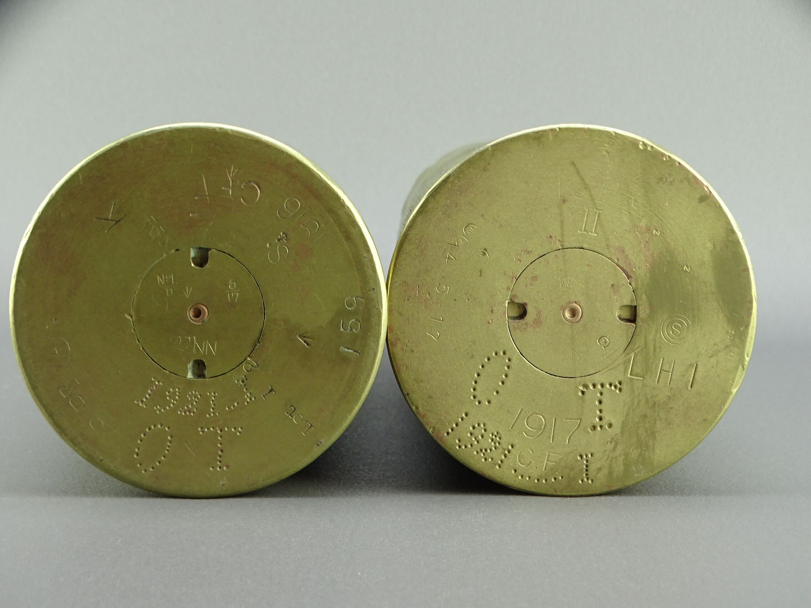 Pair of shell casings forming repulsed copper vases