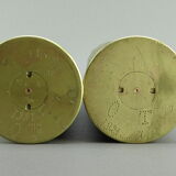 Pair of shell casings forming repulsed copper vases