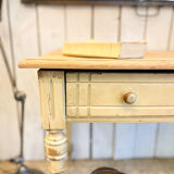 Old farmhouse table with central drawer