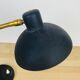 Vintage lamp from the 1950s in brass and black.