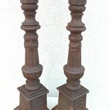 Pair of cast iron candlesticks