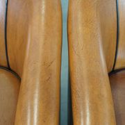 Set of 2 sheep leather club chairs finished with black piping