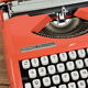 Hermès Baby orange typewriter.