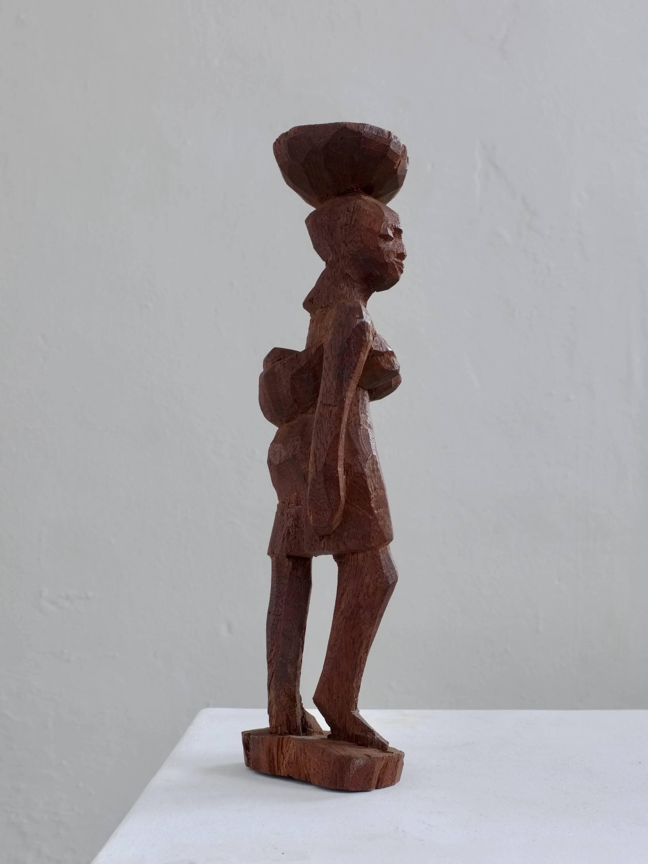 Mid-century hand-carved African woman sculpture