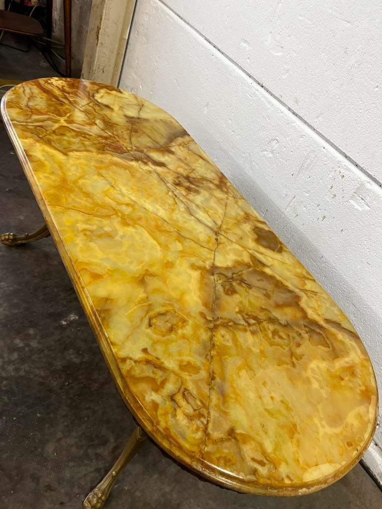 Vintage onyx coffee table with brass frame.