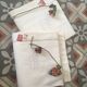 Pair mixed pillowcases embroidered A B.