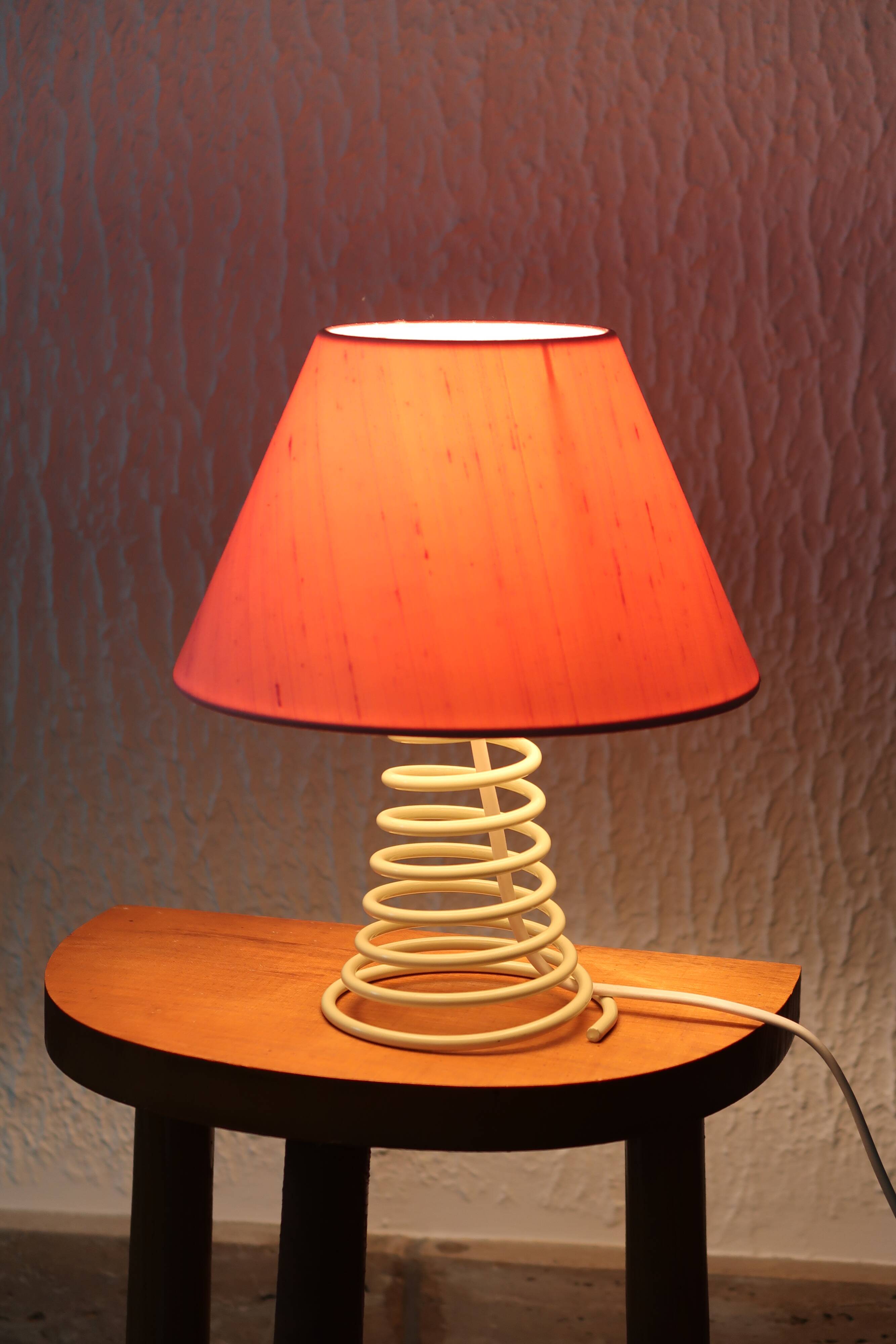 Pair of lamps, yellow spring foot, pink lampshade, 90s