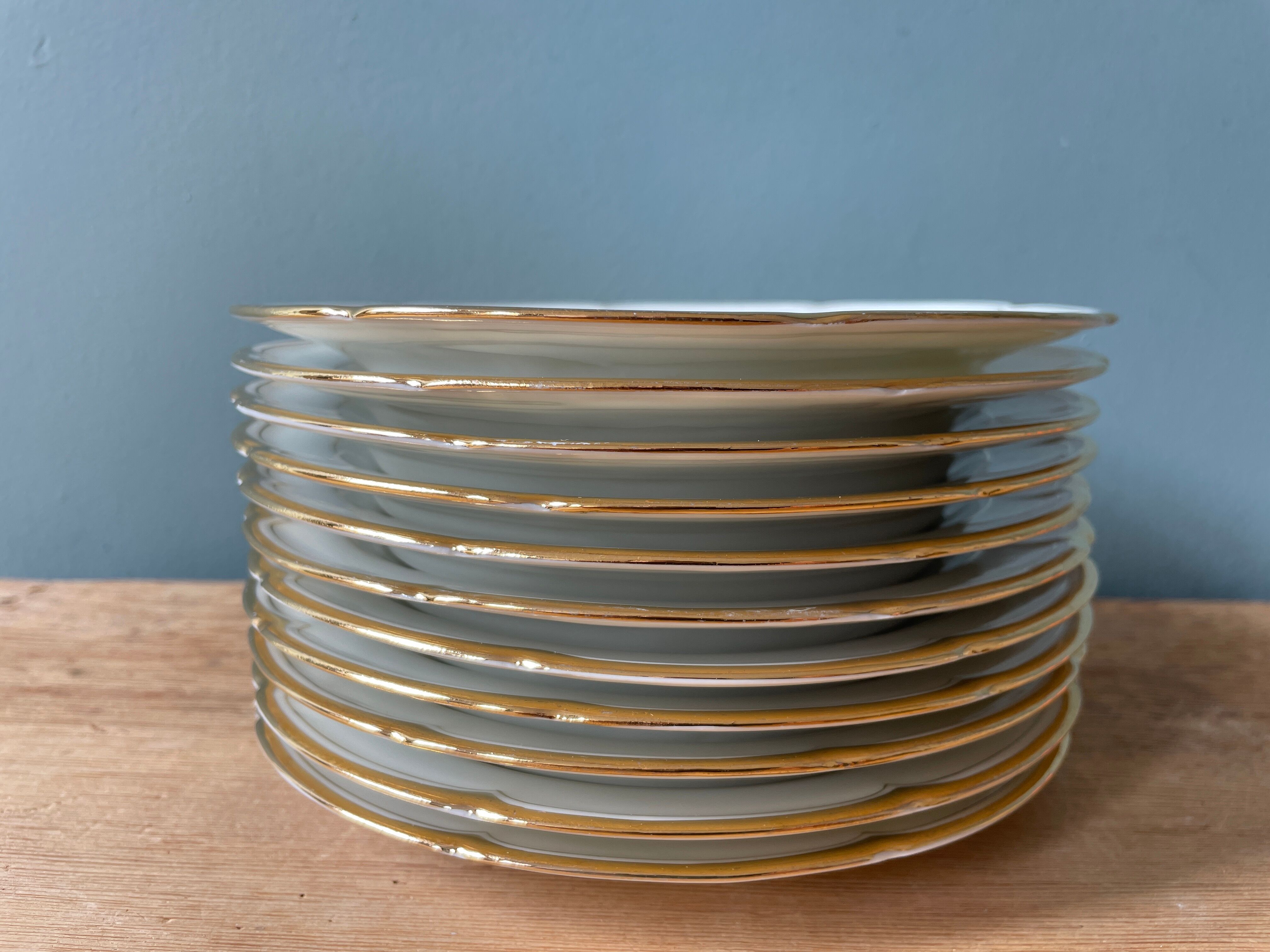 Series of 11 antique dessert plates in Vierzon porcelain